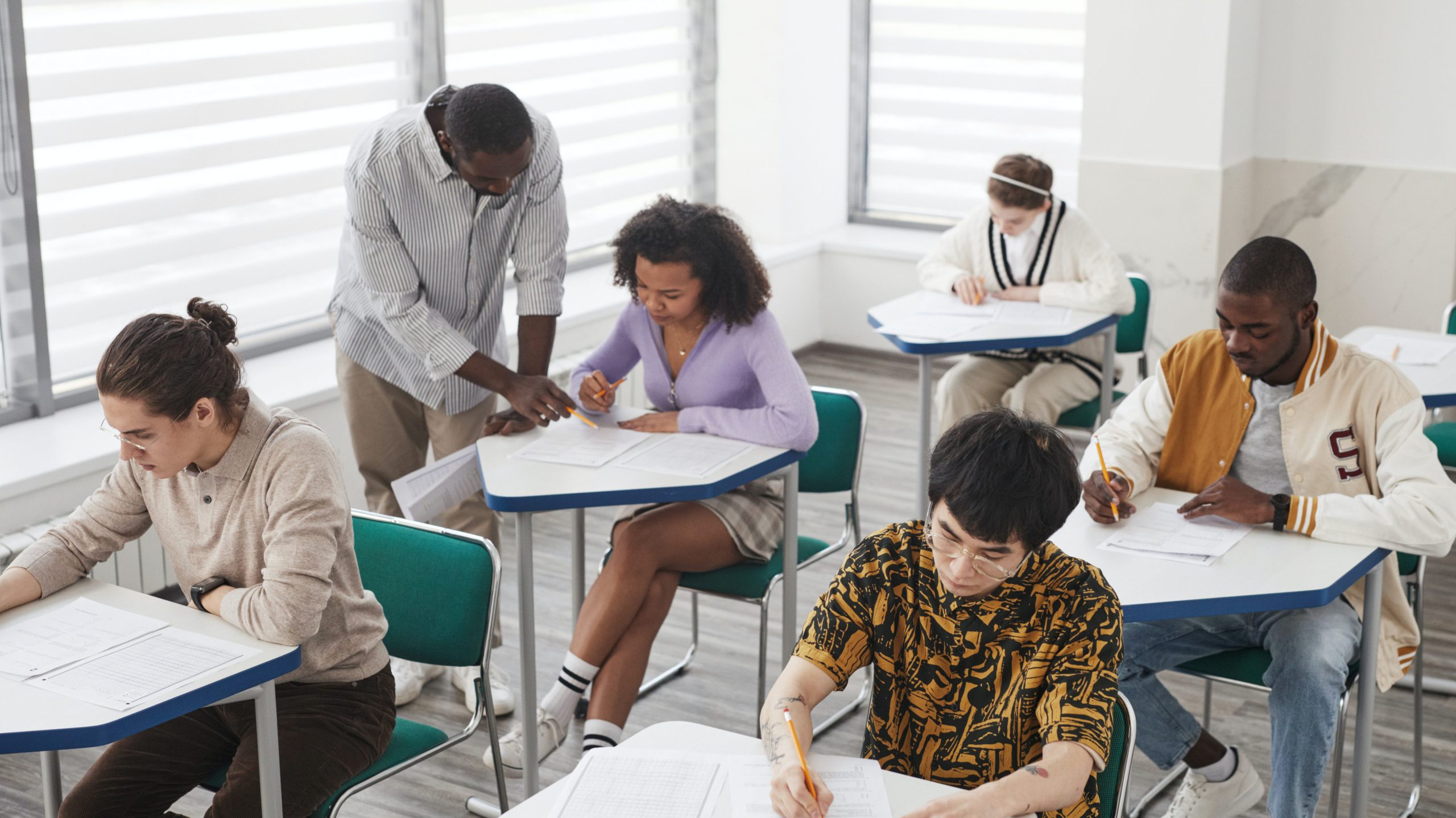 Teacher working 1 on 1 with student